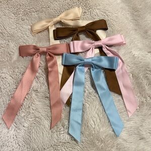 Set of 5 new, long line hair bows
